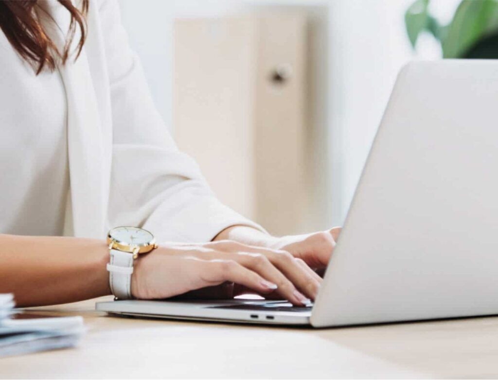 A person working on a laptop.