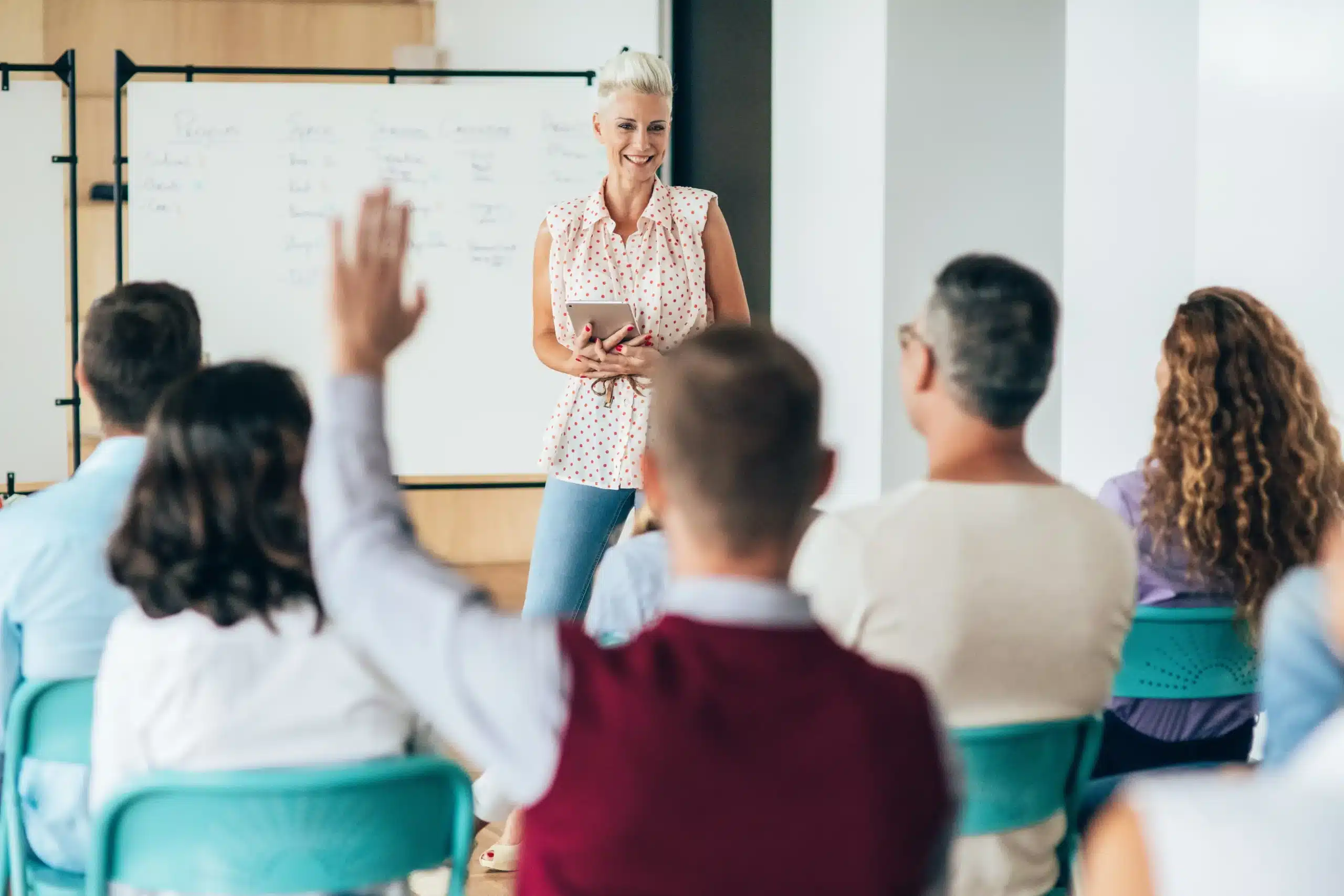 woman teaching adult learners