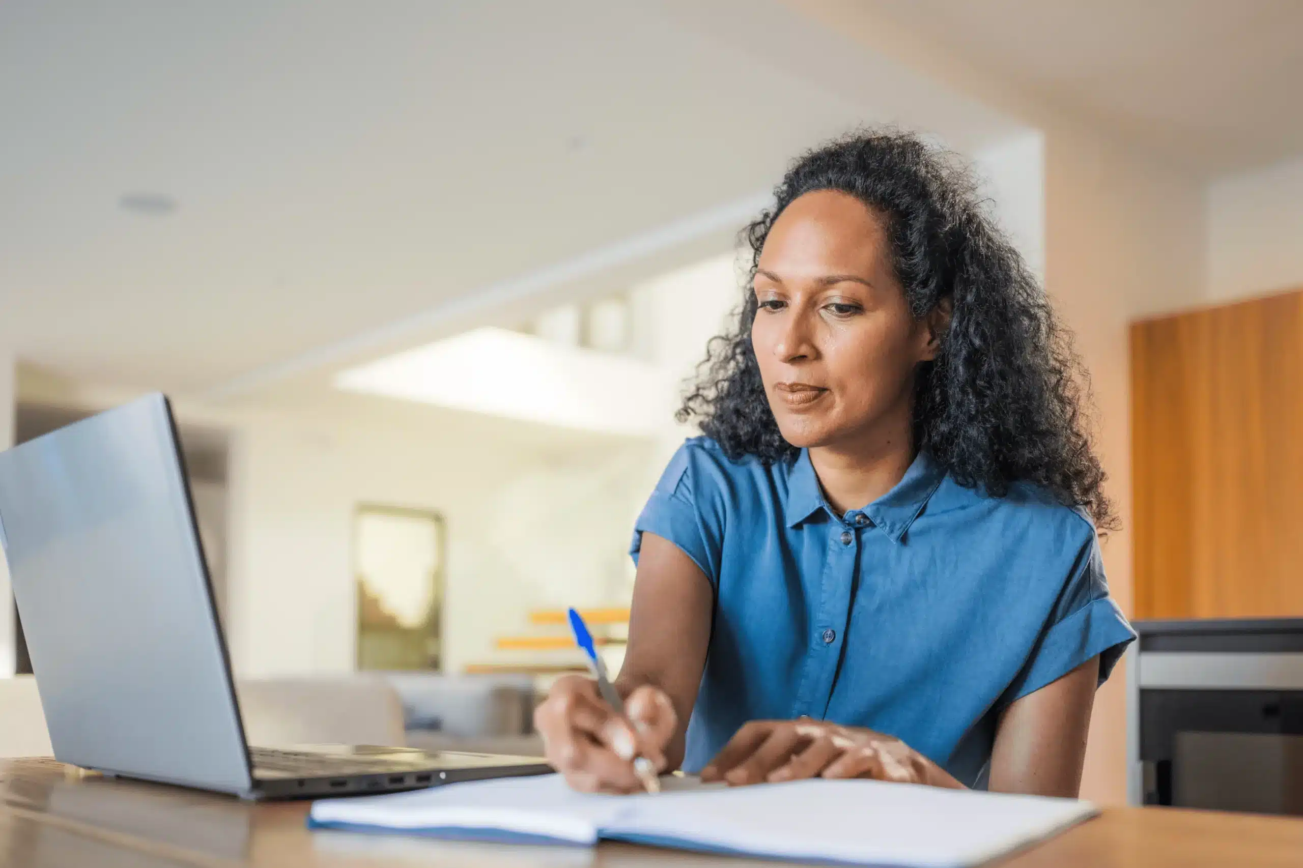 woman looking at laptop